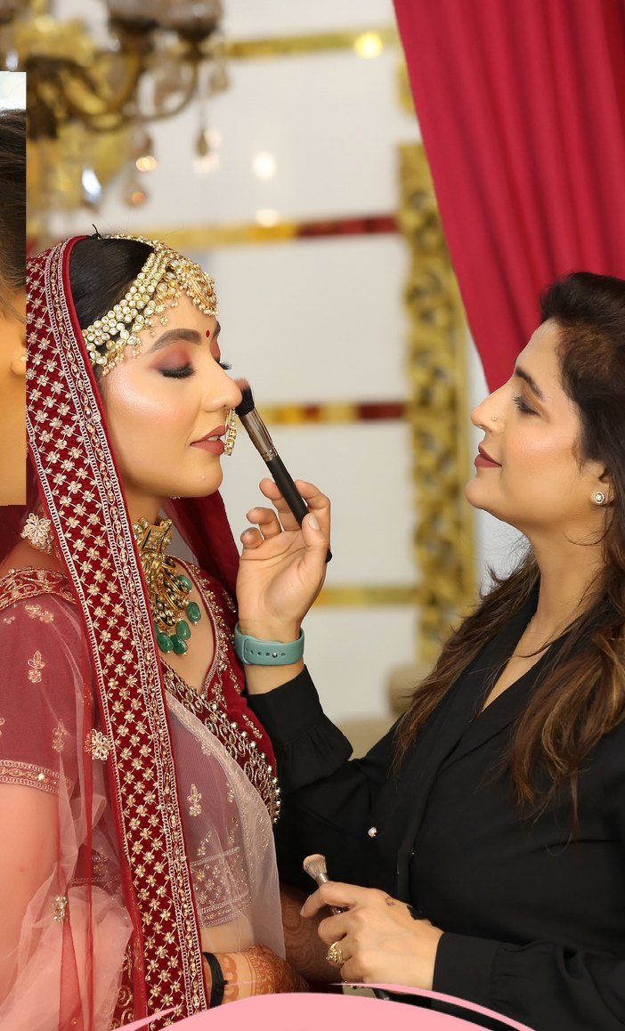 Gagnakshi Kumar applying bridal makeup